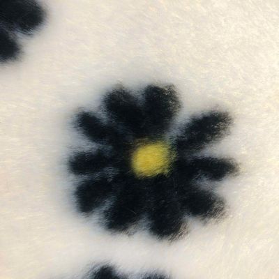 100% polyester mou Jacquard motif imprimé de la fourrure de lapin pour un attrait sophistiqué