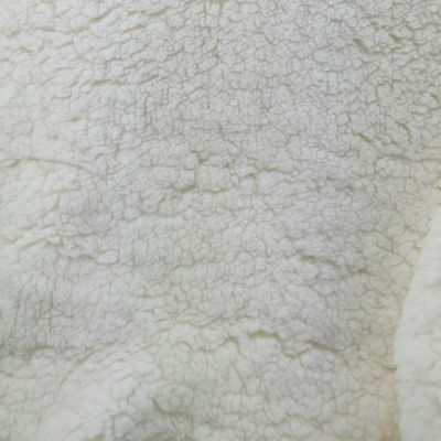 Tissus non tissés 100% polyester tricoté chaud doux de couleur blanche Sherpa