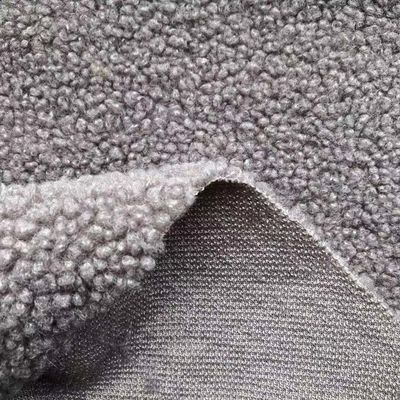 100% polyester blanc contrefait en tissu de fourrure en peluche Sherpa pour les accessoires d'hiver