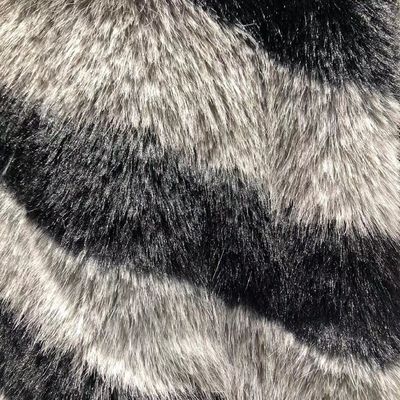 Matériau de façade 100% polyester Faux fourrure textile pour femmes Tissu pour vêtements