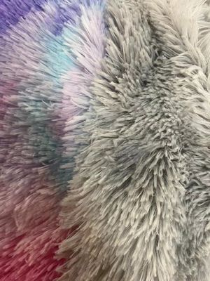 Tissu de jouet 100% polyester à teinture spéciale tricoté en plastique photovoltaïque avec motif en plastique et longue pile