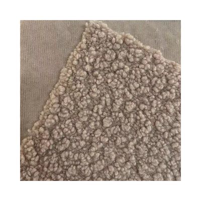 Tissus en tissu de laine de peluche en tricot doux et durable pour le textile/l'habillement/les jouets